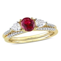 1- Carat T.G.W. Az ovális vágott rubin, a szívvágás fehér zafír és a carat T.W. Kerek vágott gyémánt 10KT sárga arany 3-kő menyasszonyi